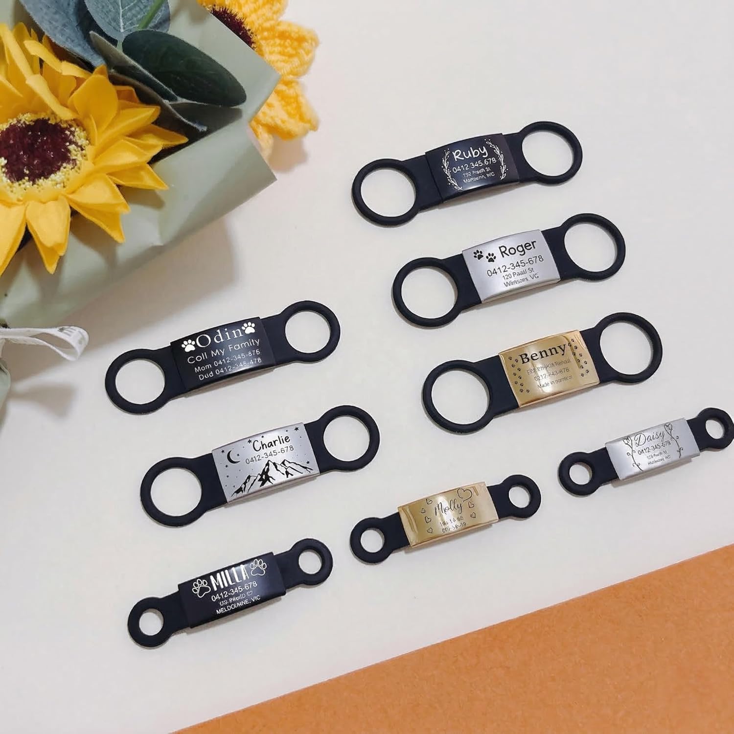 Silent slip-on ID tag — a flat engraved tag that sits flush against the collar, no hanging or jingling
